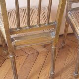 Pair of Louis XVI caned chairs with carved gilded wood.