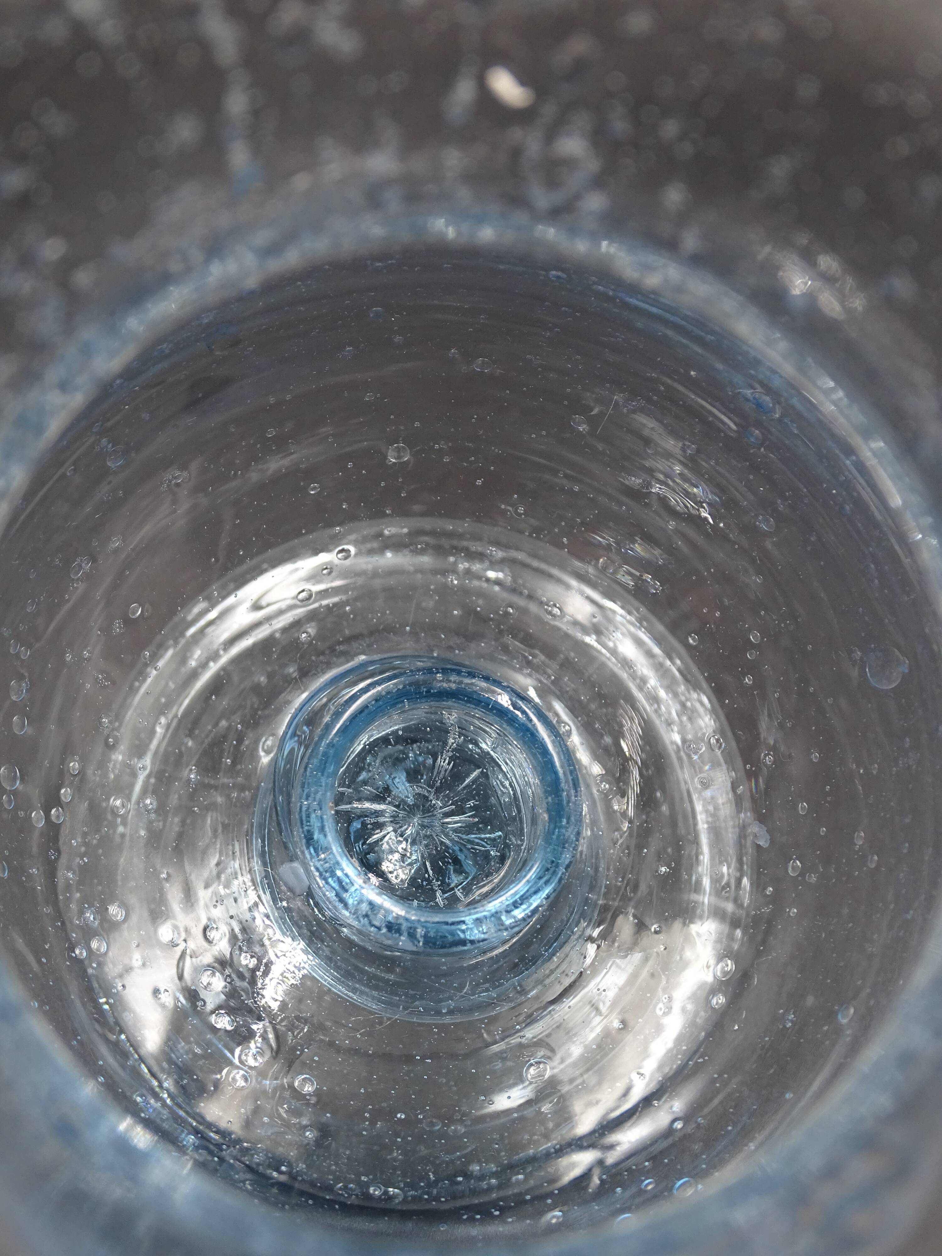 Candlestick or photophore in sky blue bulled glass, signed Biot