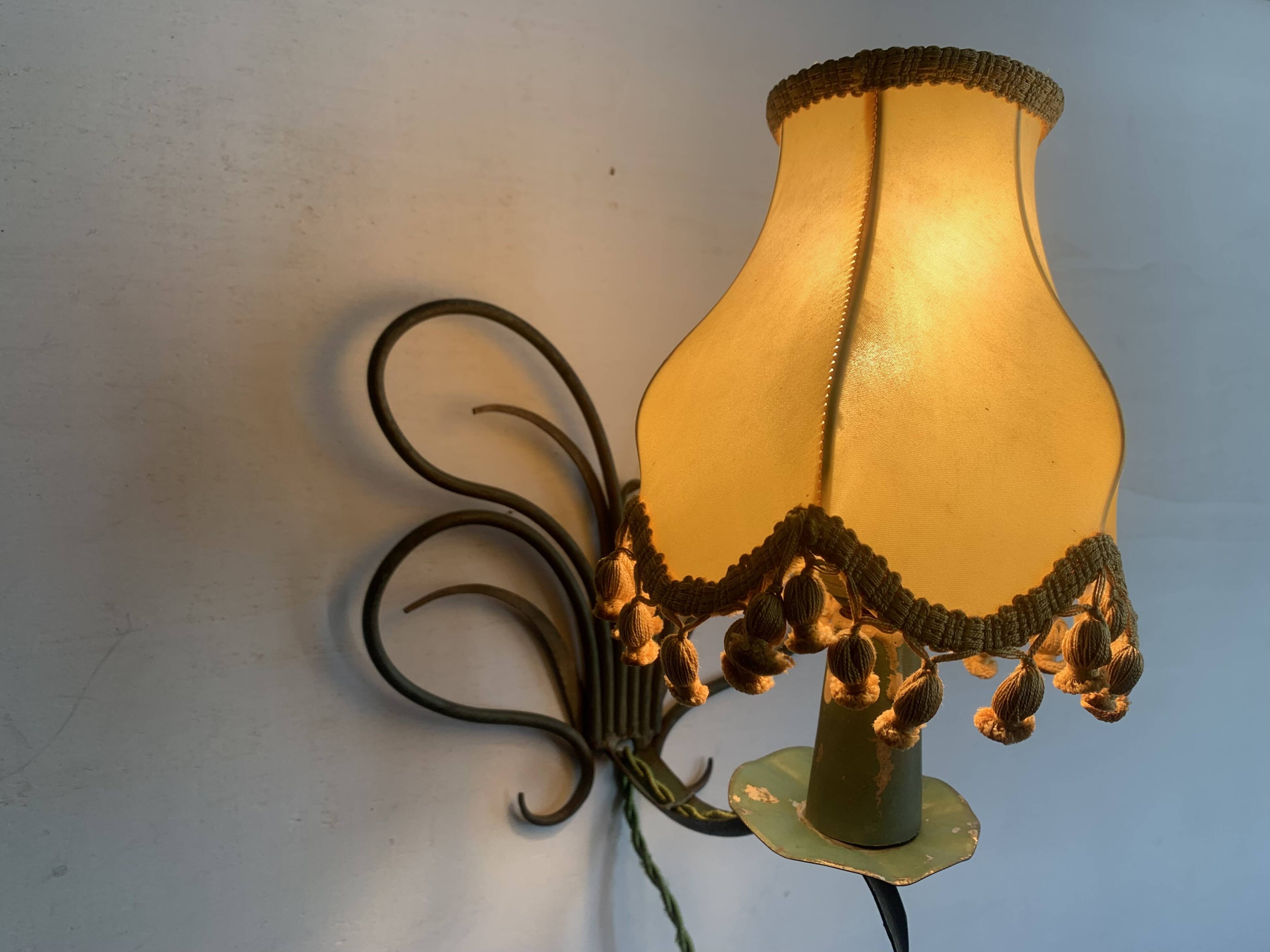 Pair of wall lights in patinated green painted iron, 1950s