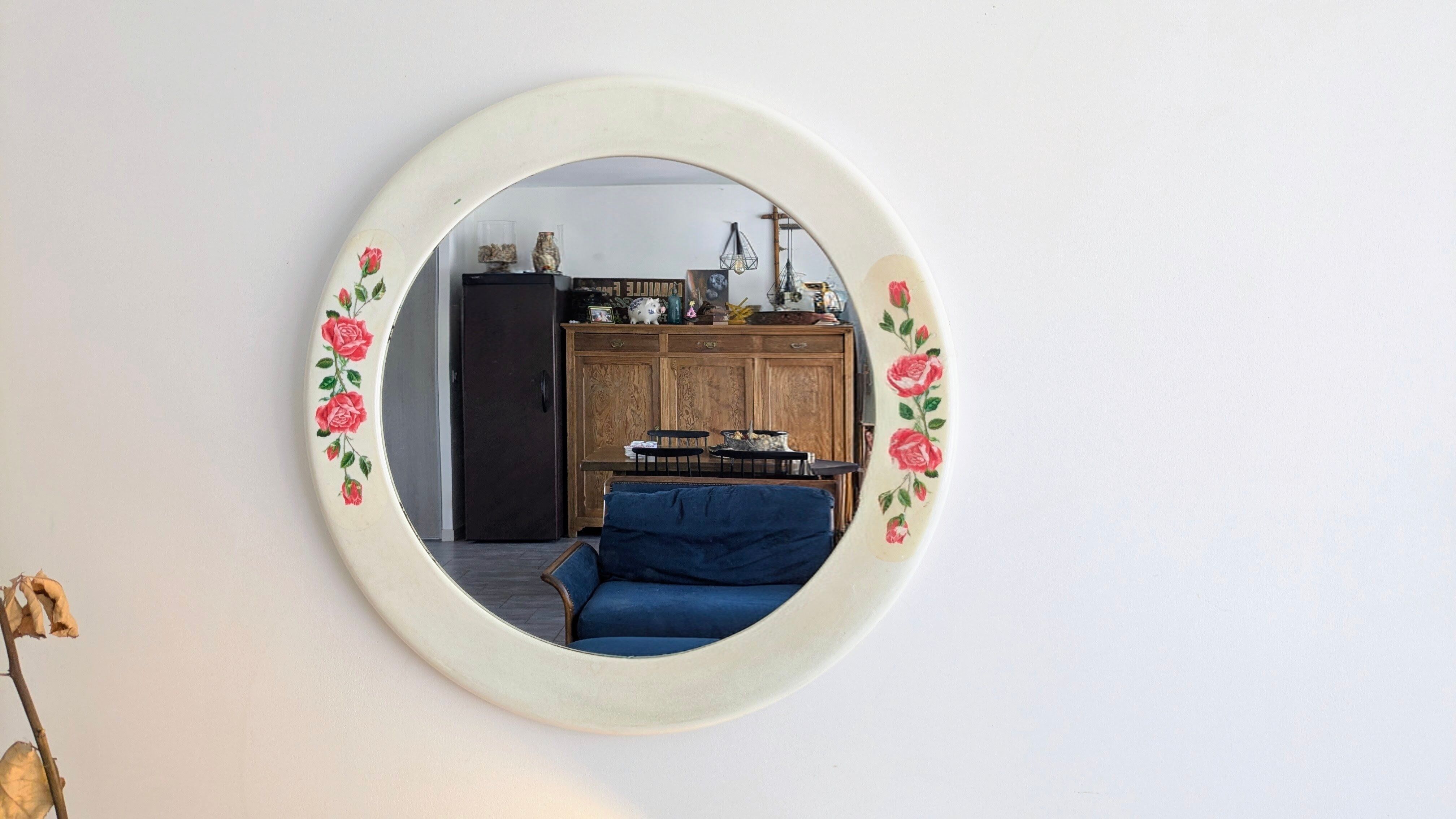 Vintage round mirror Syla model 6131 with rose decoration.
