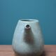 Small ceramic pitcher enamelled pale green, signed Max Idlas