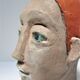 Redheaded boyish woman modeled in earth signed 60/70 years