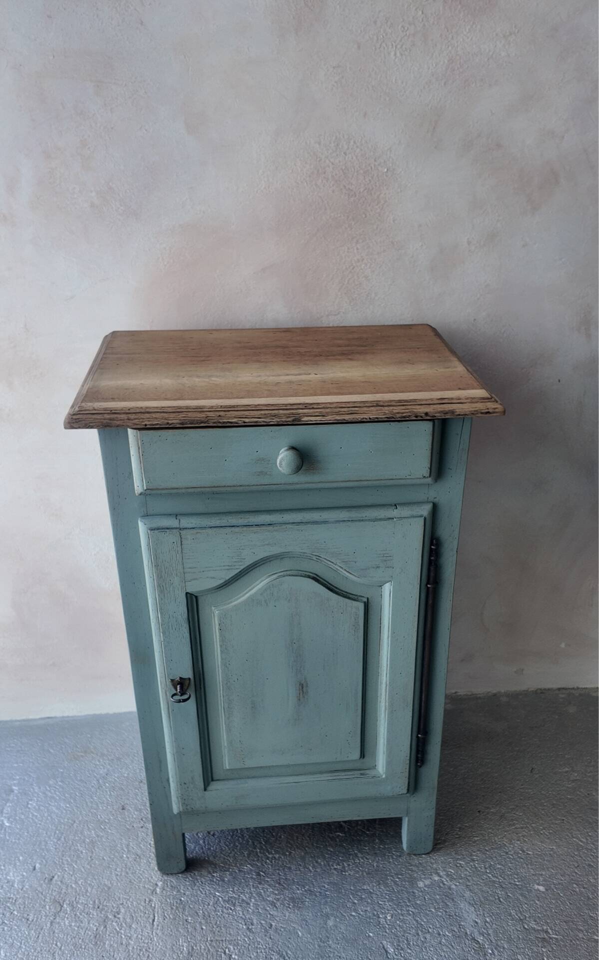 Small vintage side table in sage green patina and solid wood.