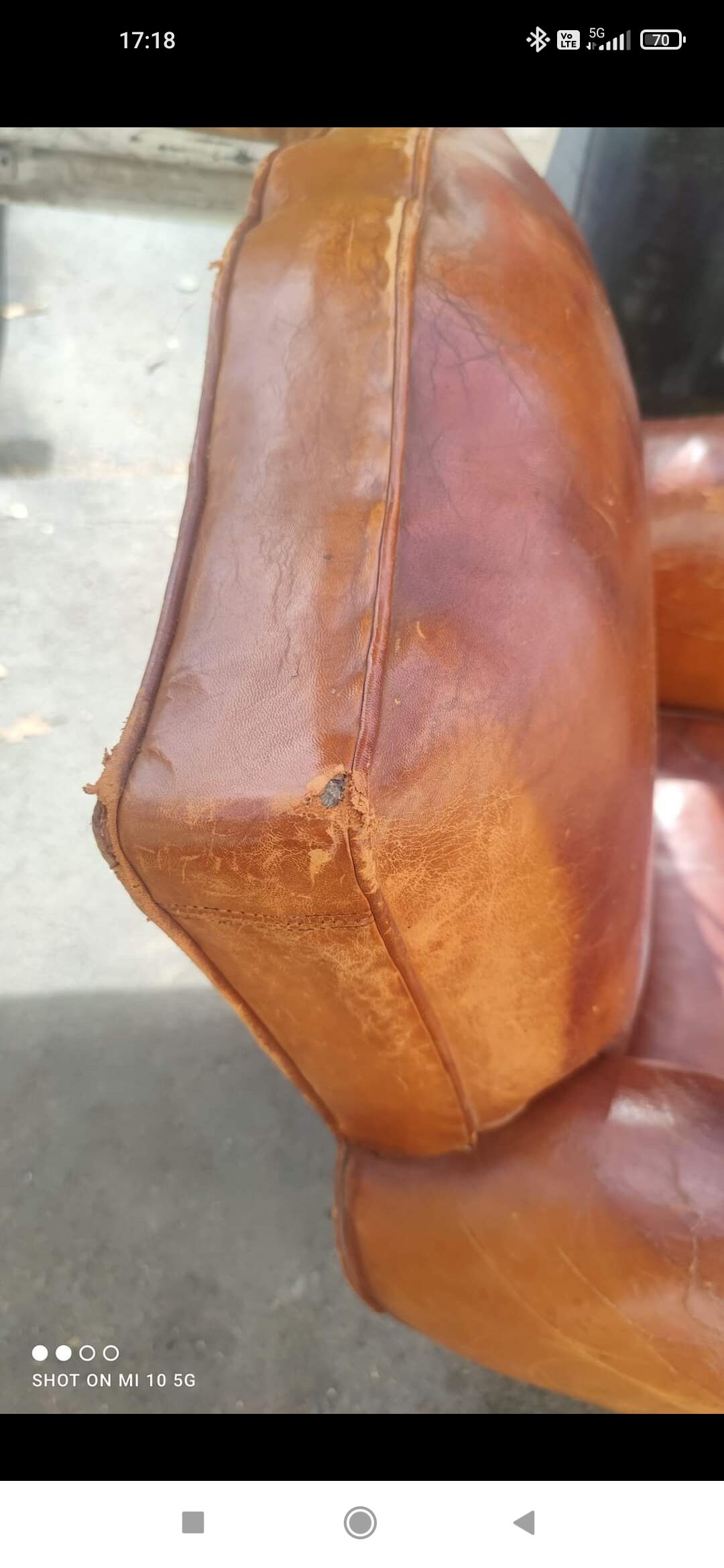 Pair of club chairs with moustache-shaped handles in Havana leather, in their original condition, circa 1930