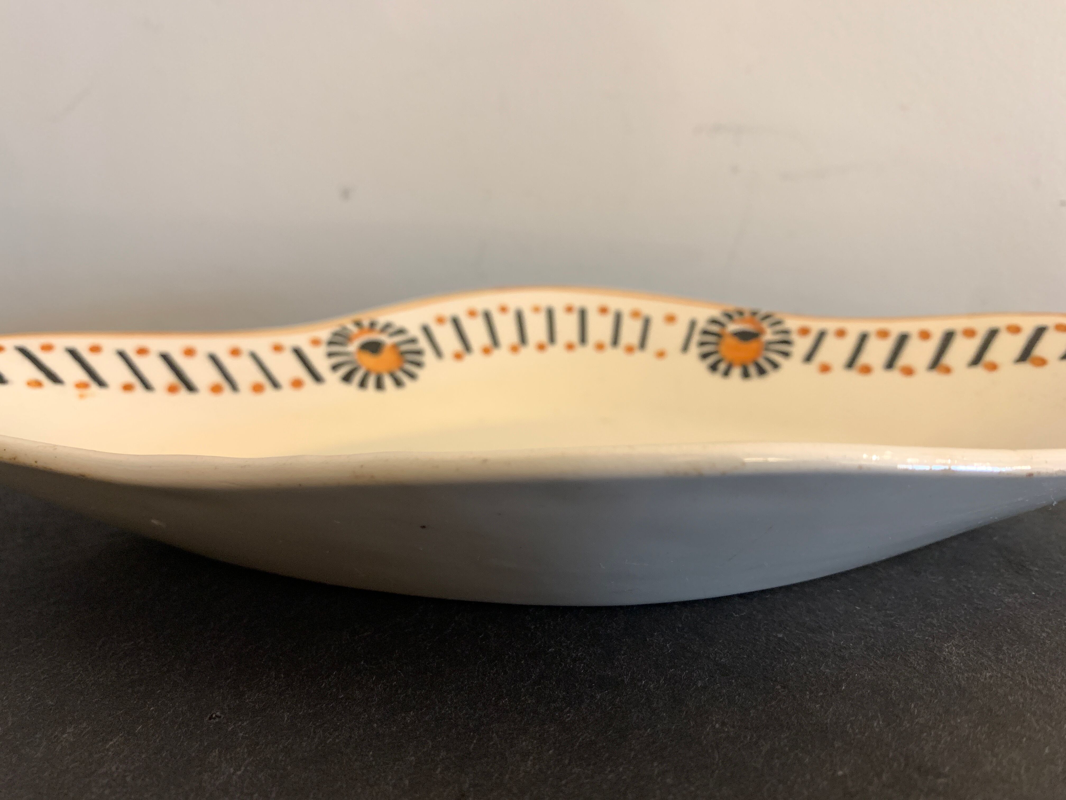 Pair of art deco raviers signed Longwy and numbered, model Gerazine