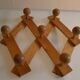 Brutalist wooden accordion wall coat rack with 7 hooks