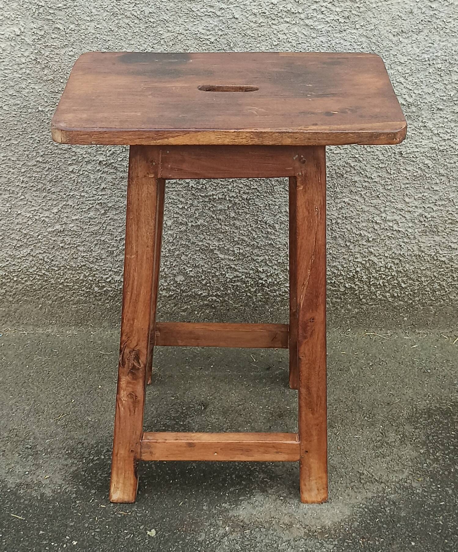 Old wooden high stool
