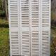 Pair of old shutters with louvers