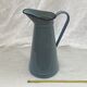 Old broc in enamelled sheet metal light blue color