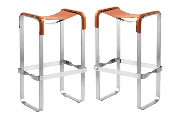 Pair of backless stools in tobacco colour with metal finishes.