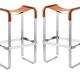 Pair of backless stools in tobacco colour with metal finishes.