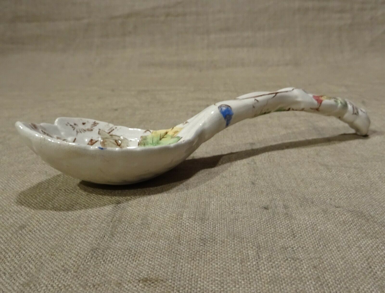 Old spoon with earthenware sauce with floral decoration Longchamp Sarreguemines