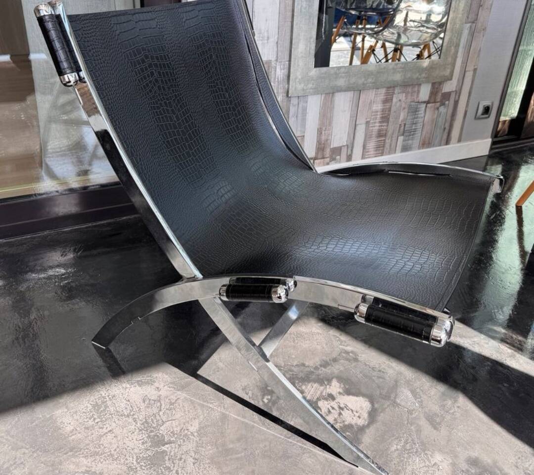 ILVA Cuba model armchair in black leather, Denmark, 2000s.