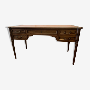 Bureau plat de style Louis XVI en acajou dessus de cuir fauve xx siècle