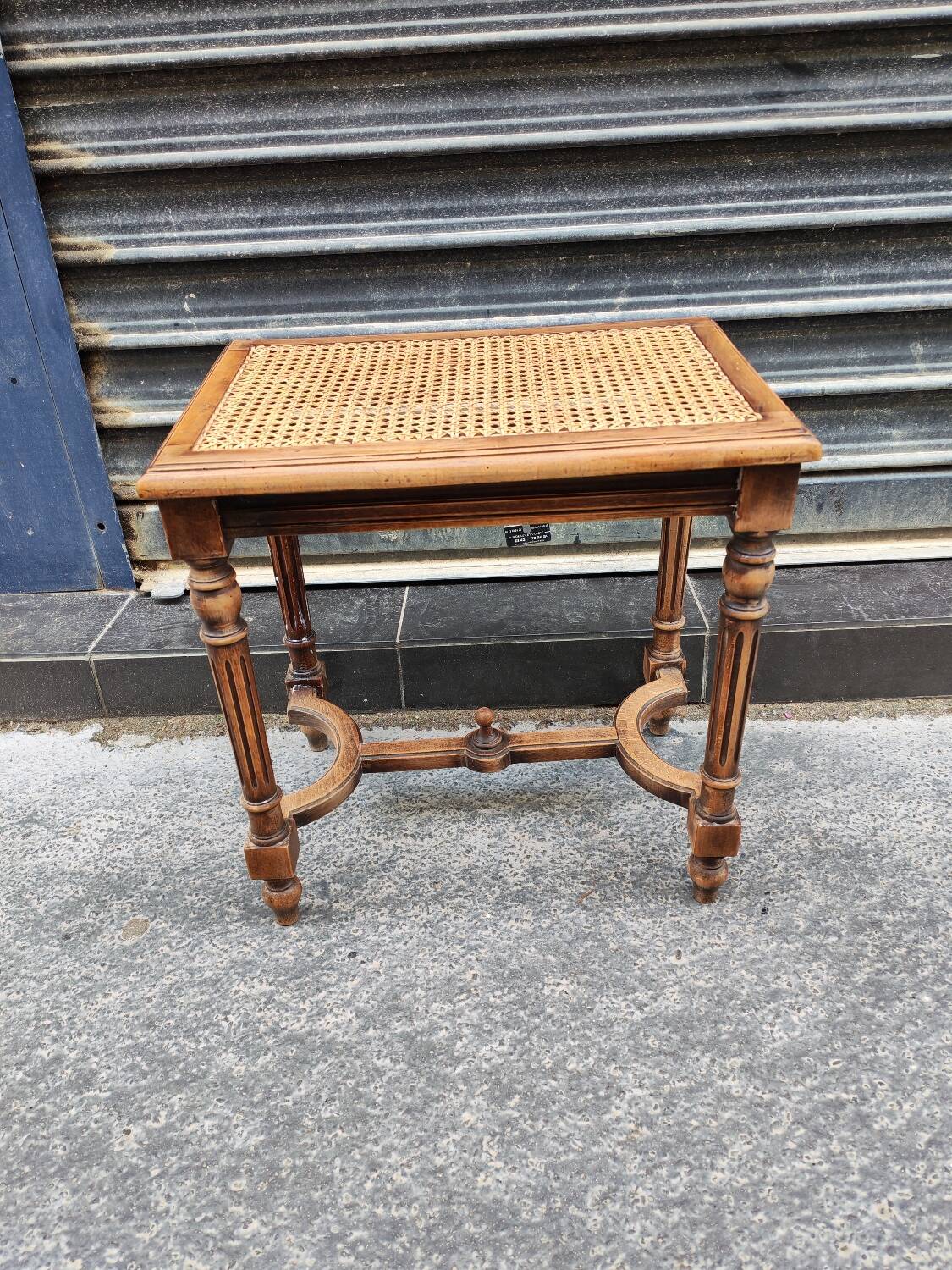 Wooden and cane bench