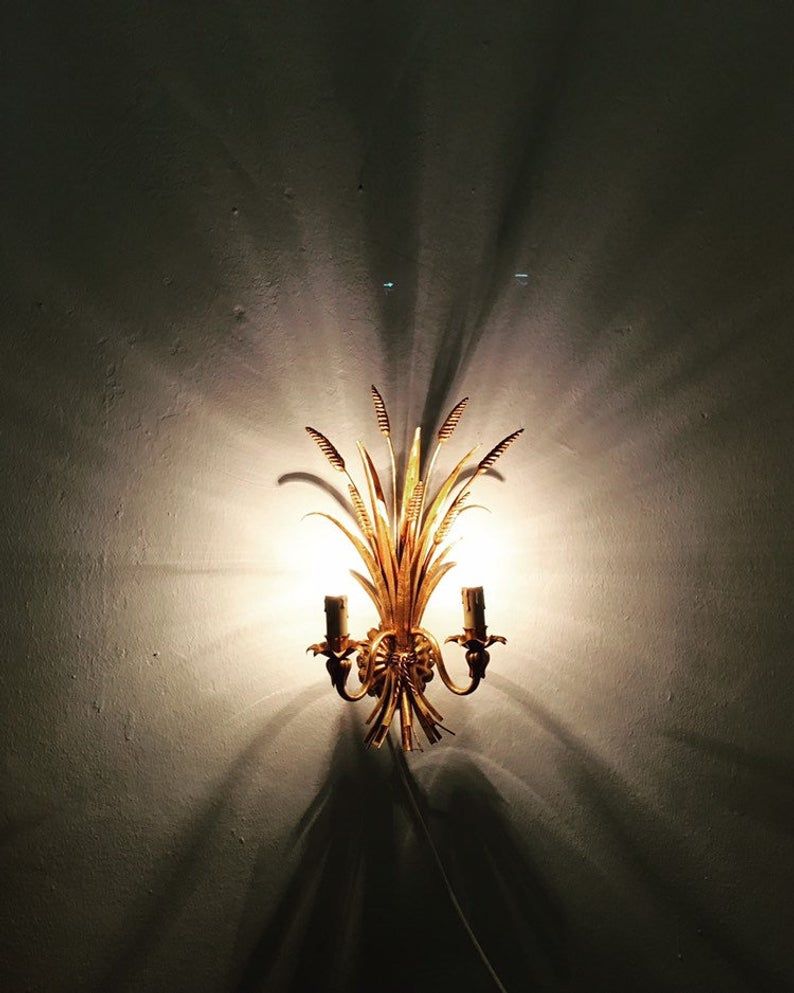 Pair of Italian Hollywood Regency metal wall lamps by Hans Kogl