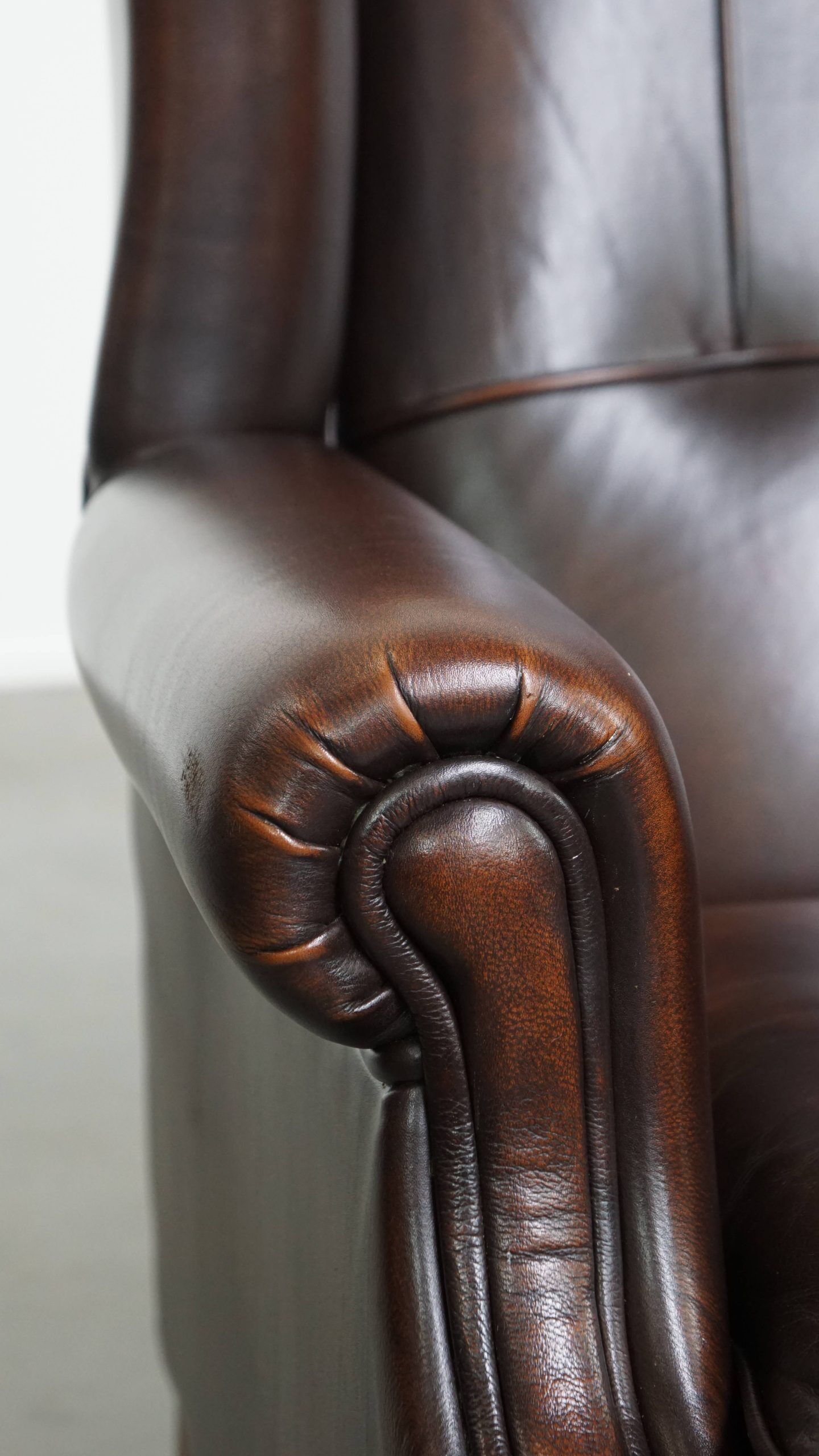 Very beautiful wing chair made of cowhide leather in English style