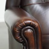 Very beautiful wing chair made of cowhide leather in English style