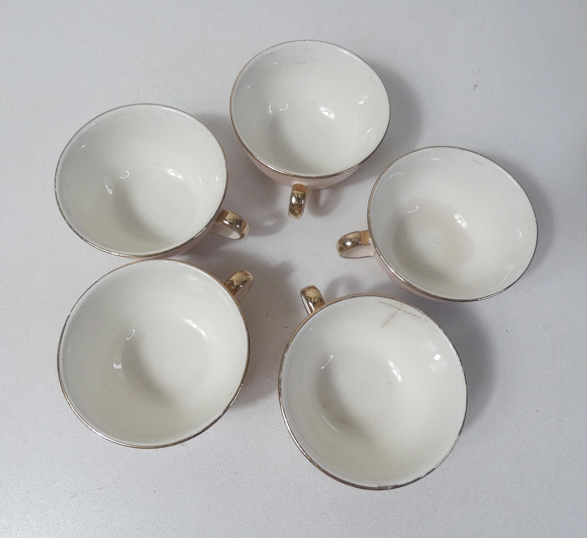 5 tasses Villeroy & Boch rose et or par Lucien Engel
