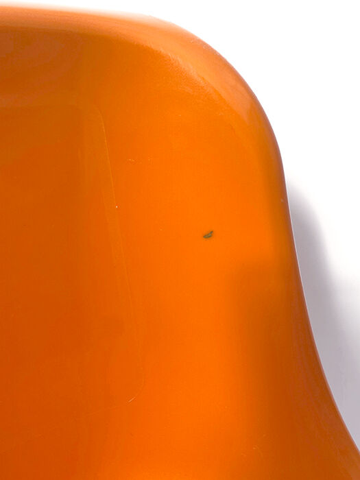 Children's chair in orange plastic