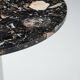 Round sidetable with stone top and three chromed legs