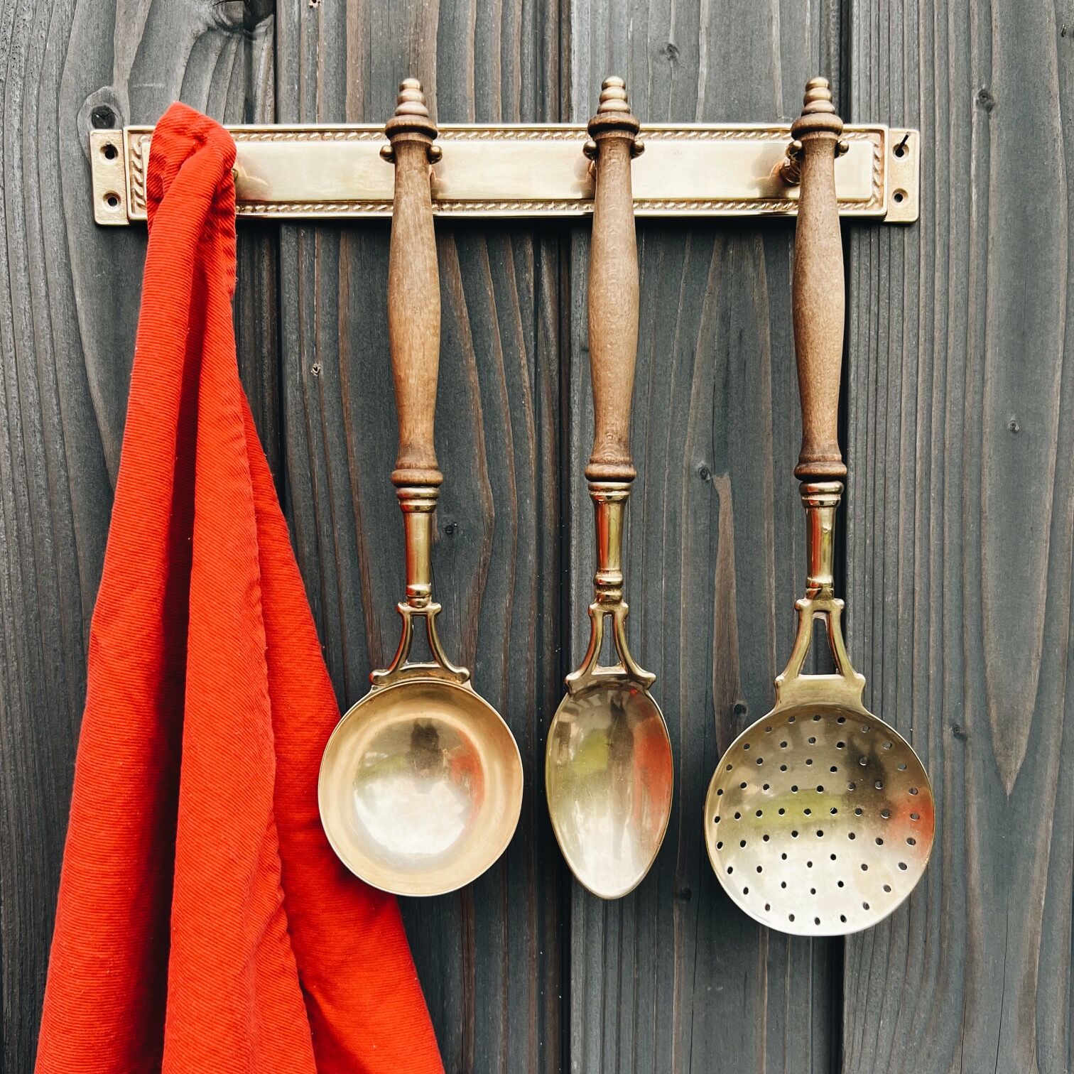 Brass holder with 3 brass & wood utensils