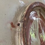 Vintage ceramic plate with enamel decoration
