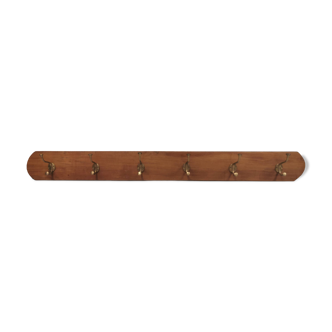 Coat rack in teak and brass. Denmark 1970-80s