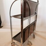 Rolling dessert, trolley says 'dinett'