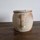 Ancient terracotta pot with a handle