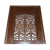 Pair of cast iron door grilles with its coat