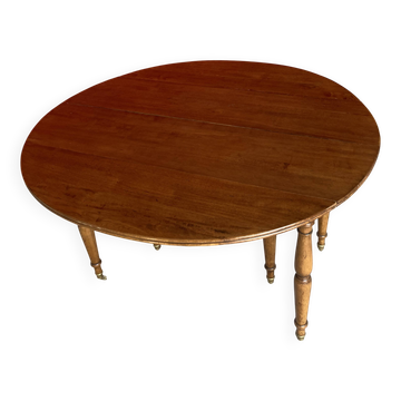 Drop-leaf table in cherry wood.