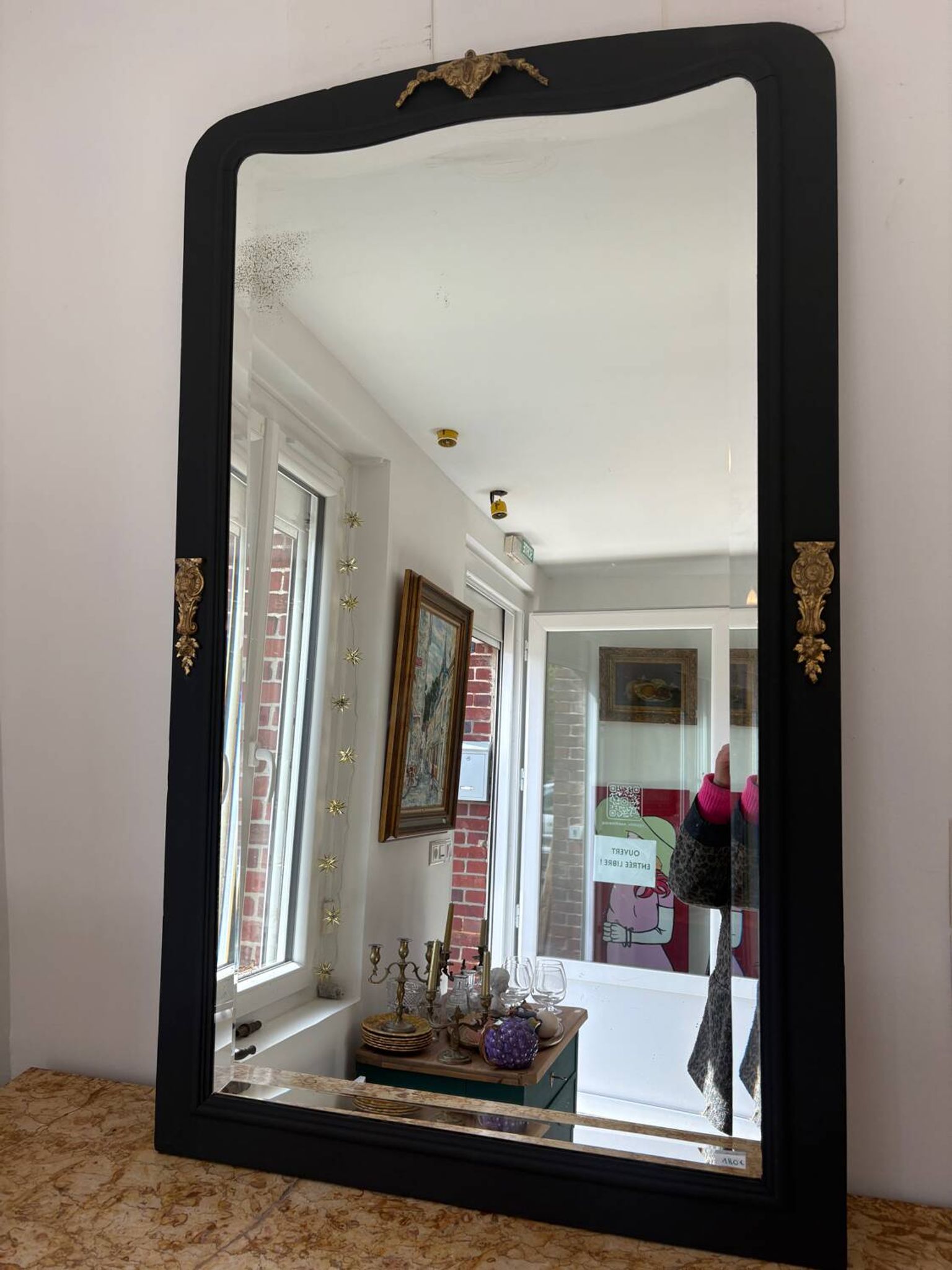 Large matte black mirror