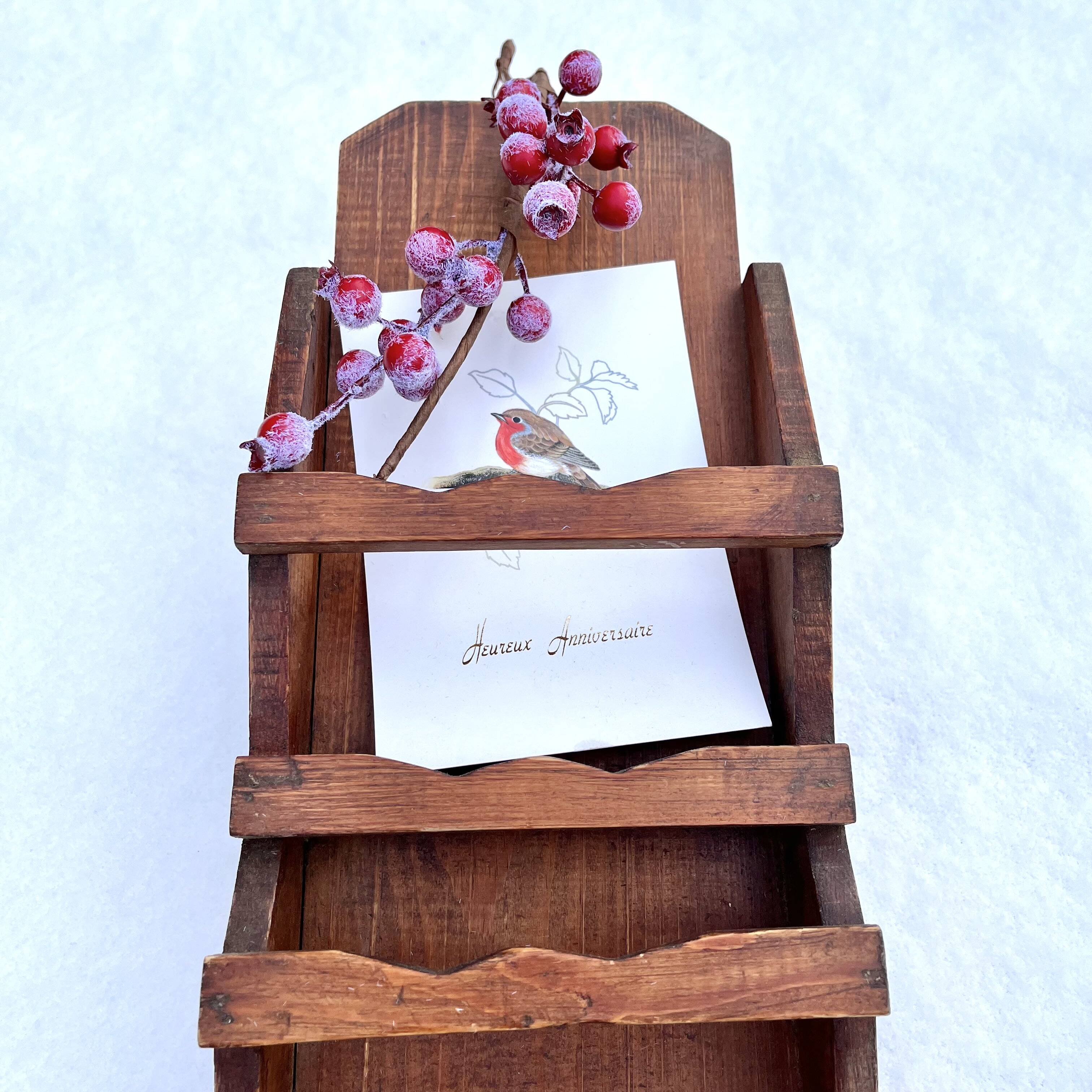 Old wall shelf for postcards or mail