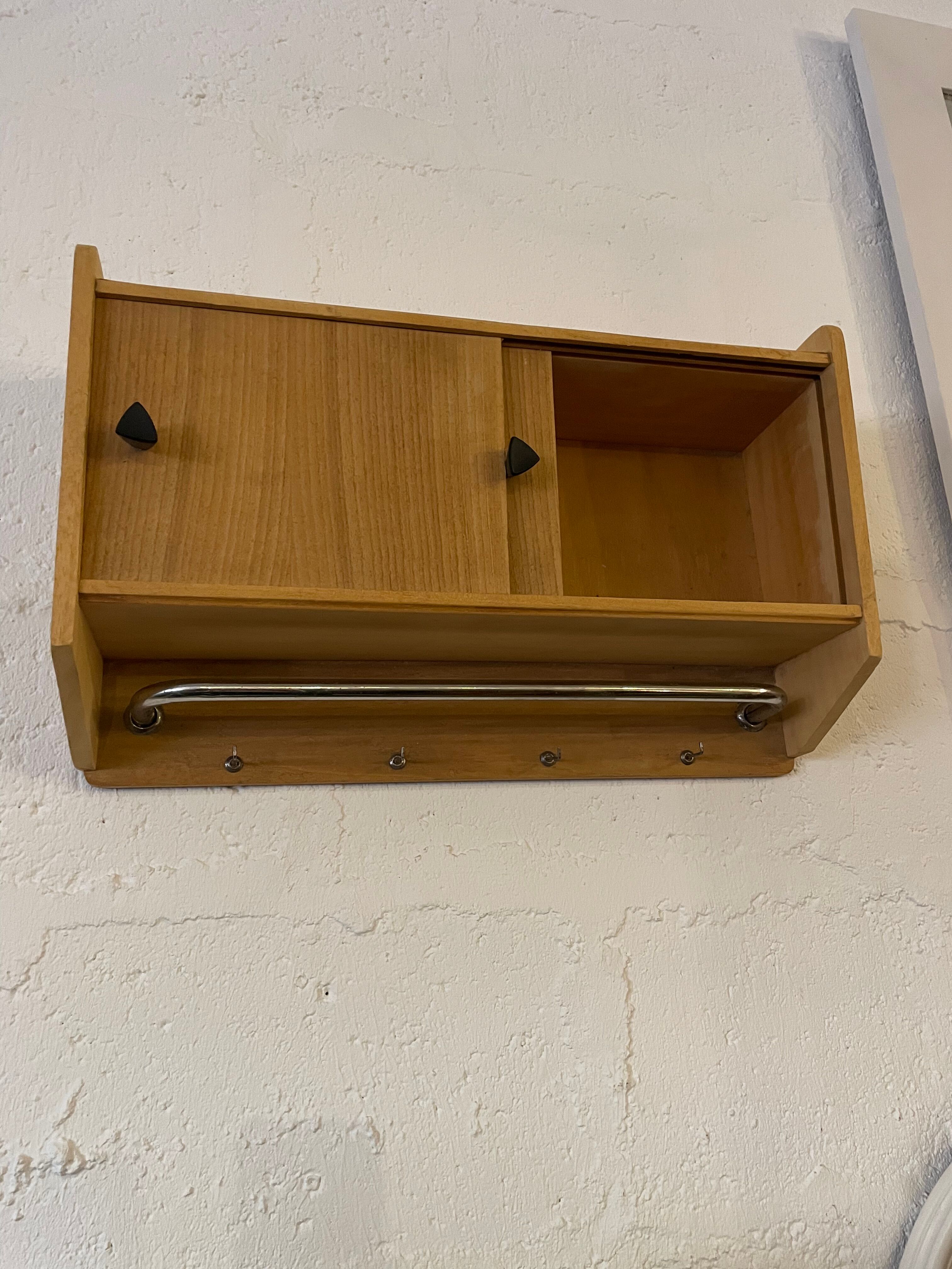 Hanging cabinet in vintage metal wood