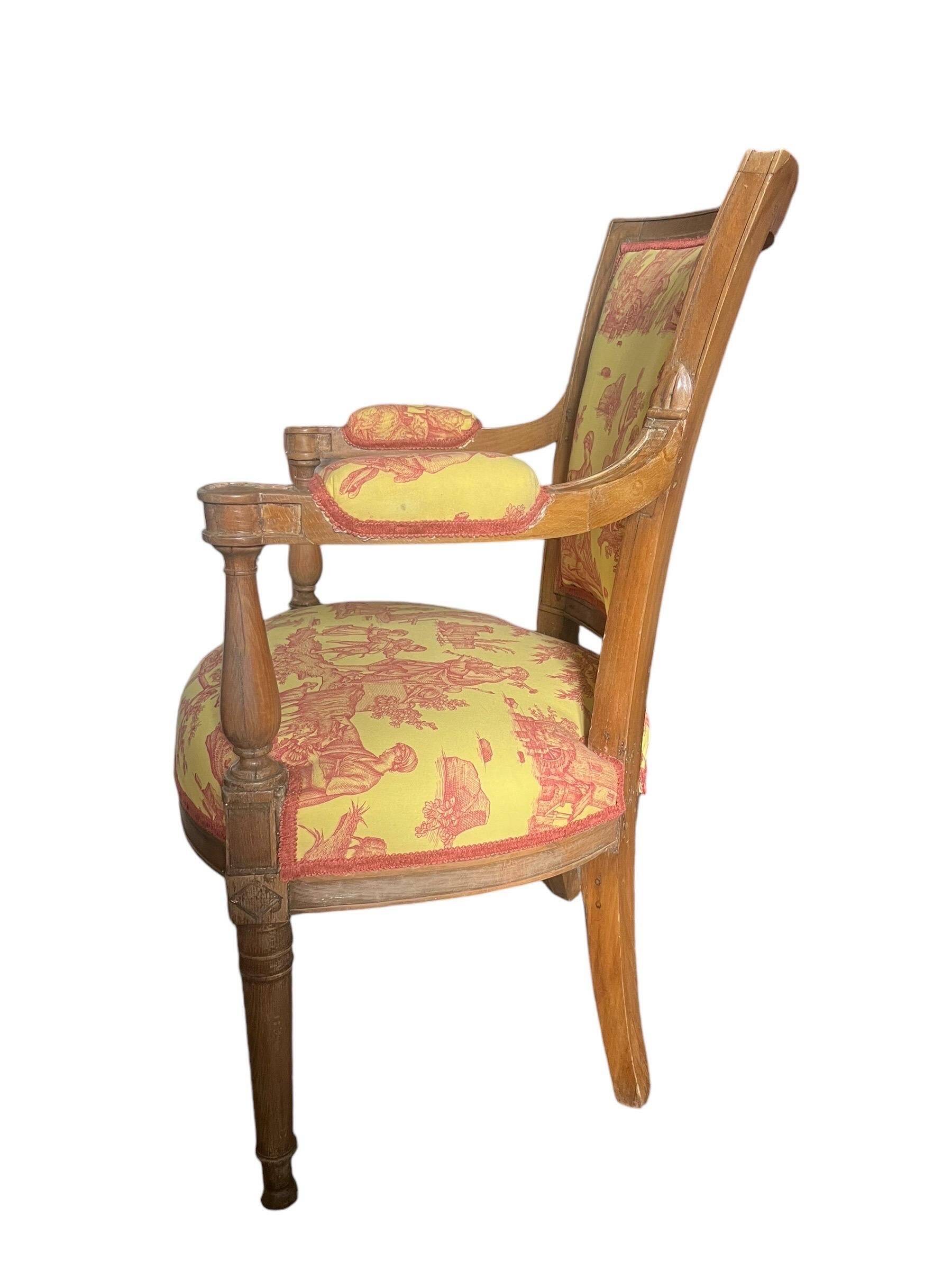 Louis XVI cabriolet armchair - Yellow and pinkish red Toile de Jouy - France