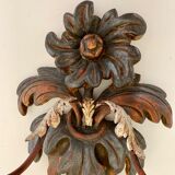 Appliques murales en bois sculpté
