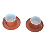 terracotta cups with saucers