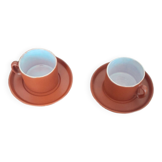 terracotta cups with saucers