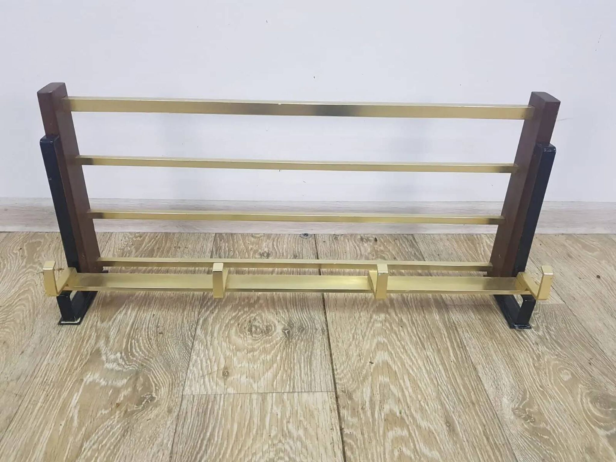 Wall-mounted coat rack, rosewood, gold-tone brass, Austria, 1960s.