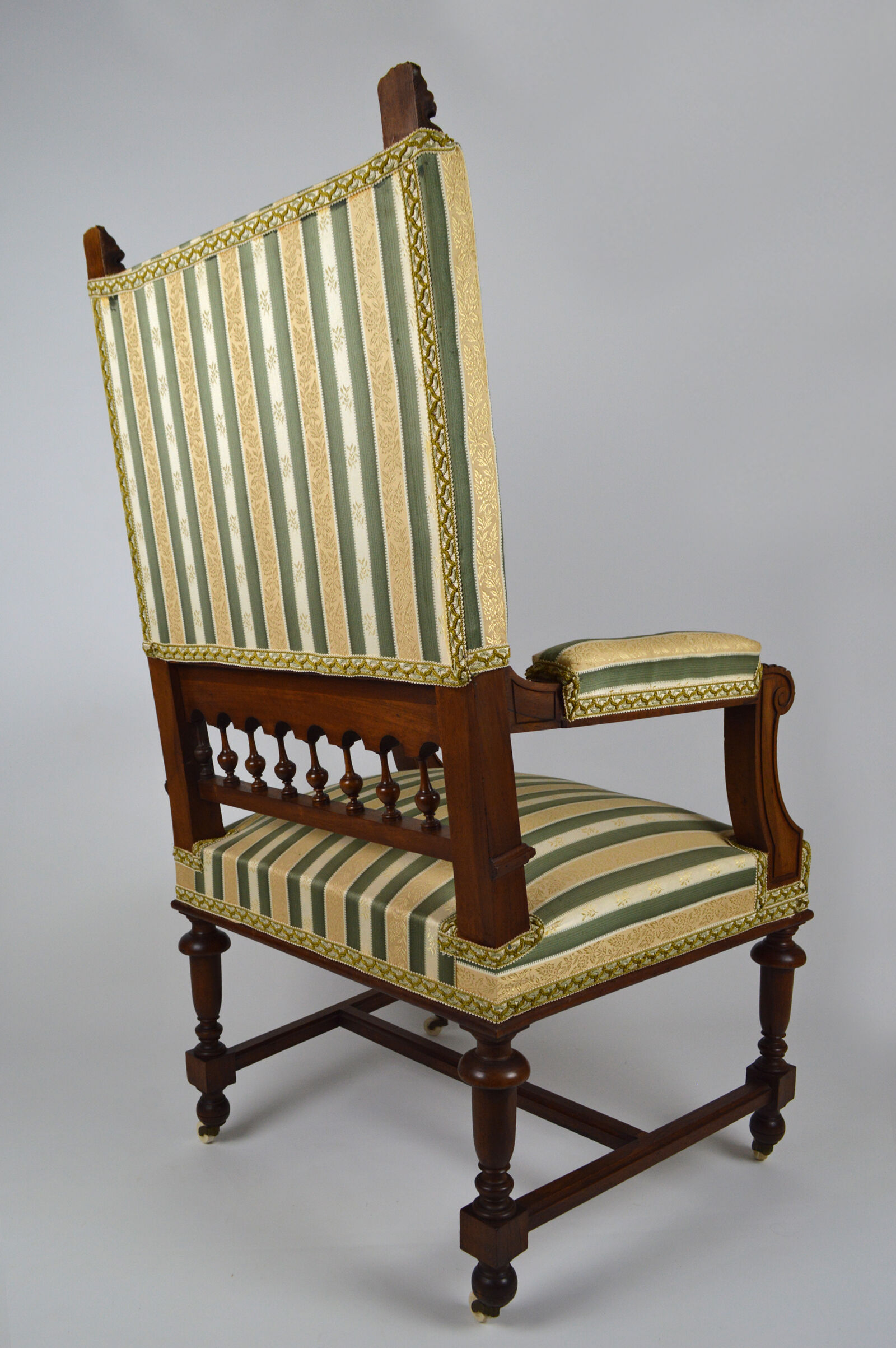Neo-Renaissance walnut armchair with lion heads, circa 1880
