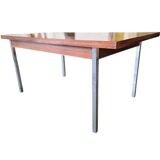 Vintage wooden dining table with chrome frame.