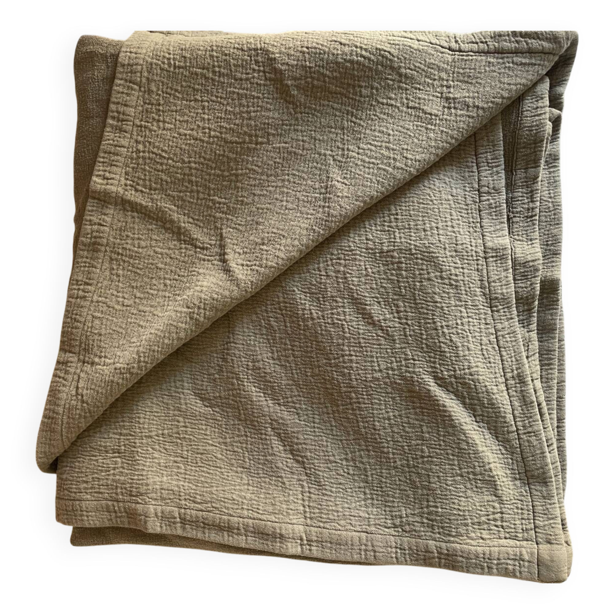 Almond-colored Caravan bedspread