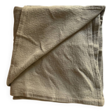 Almond-colored Caravan bedspread