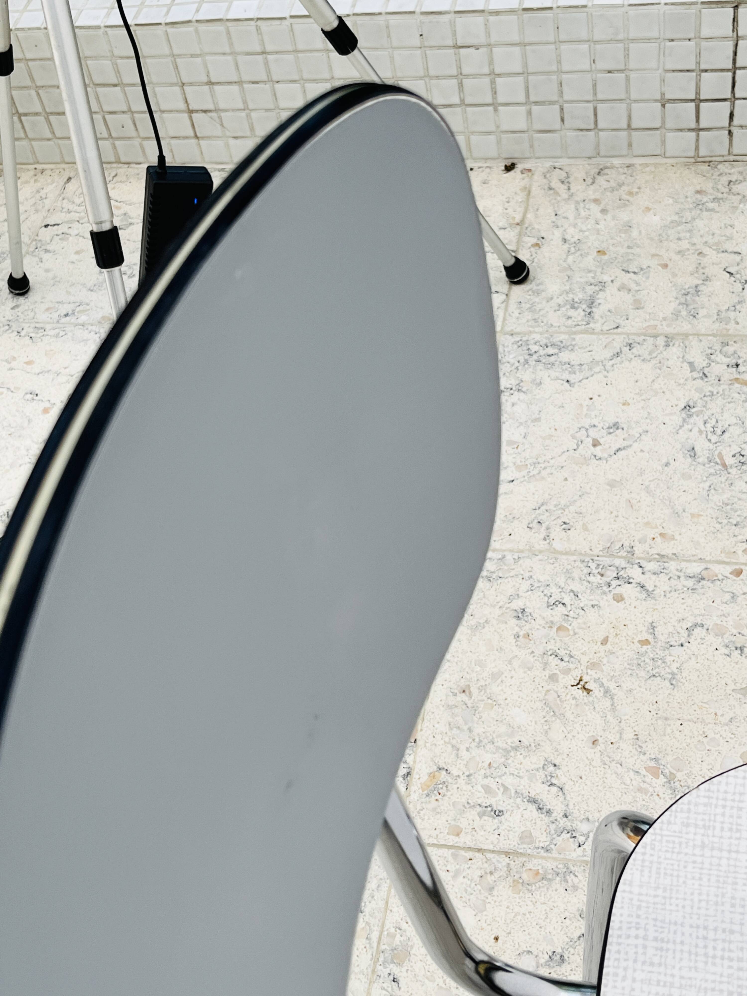 Set of two vintage grey Formica and chrome chairs.
