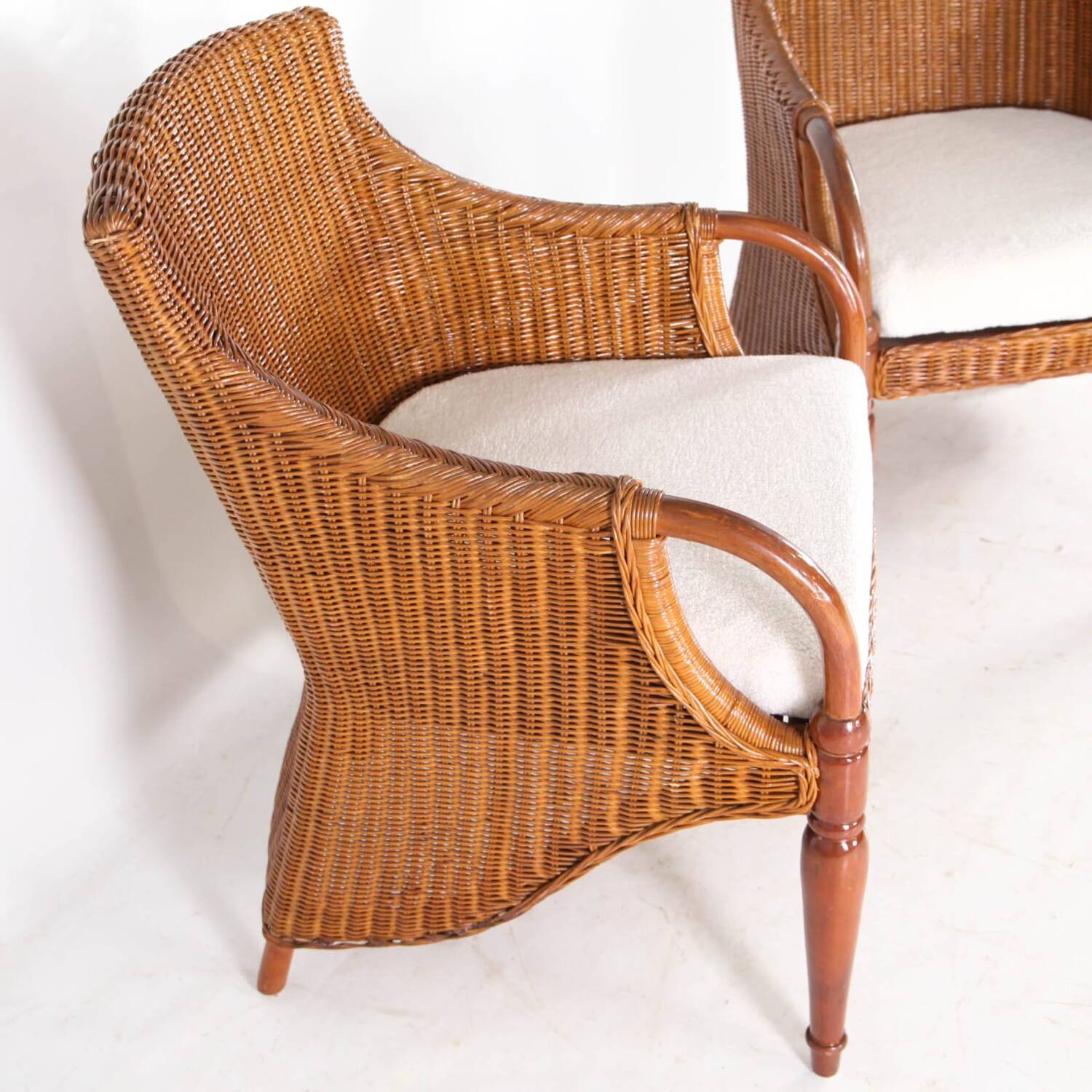 Pair of wooden and wicker armchairs