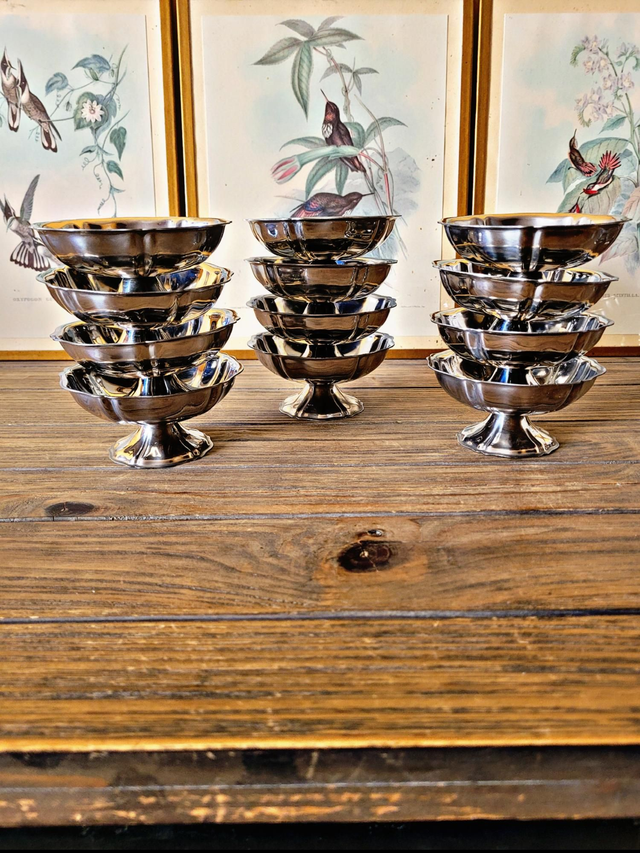 Stainless steel ice bowls by Guy Degrenne, low bowls in the shape of a flower.