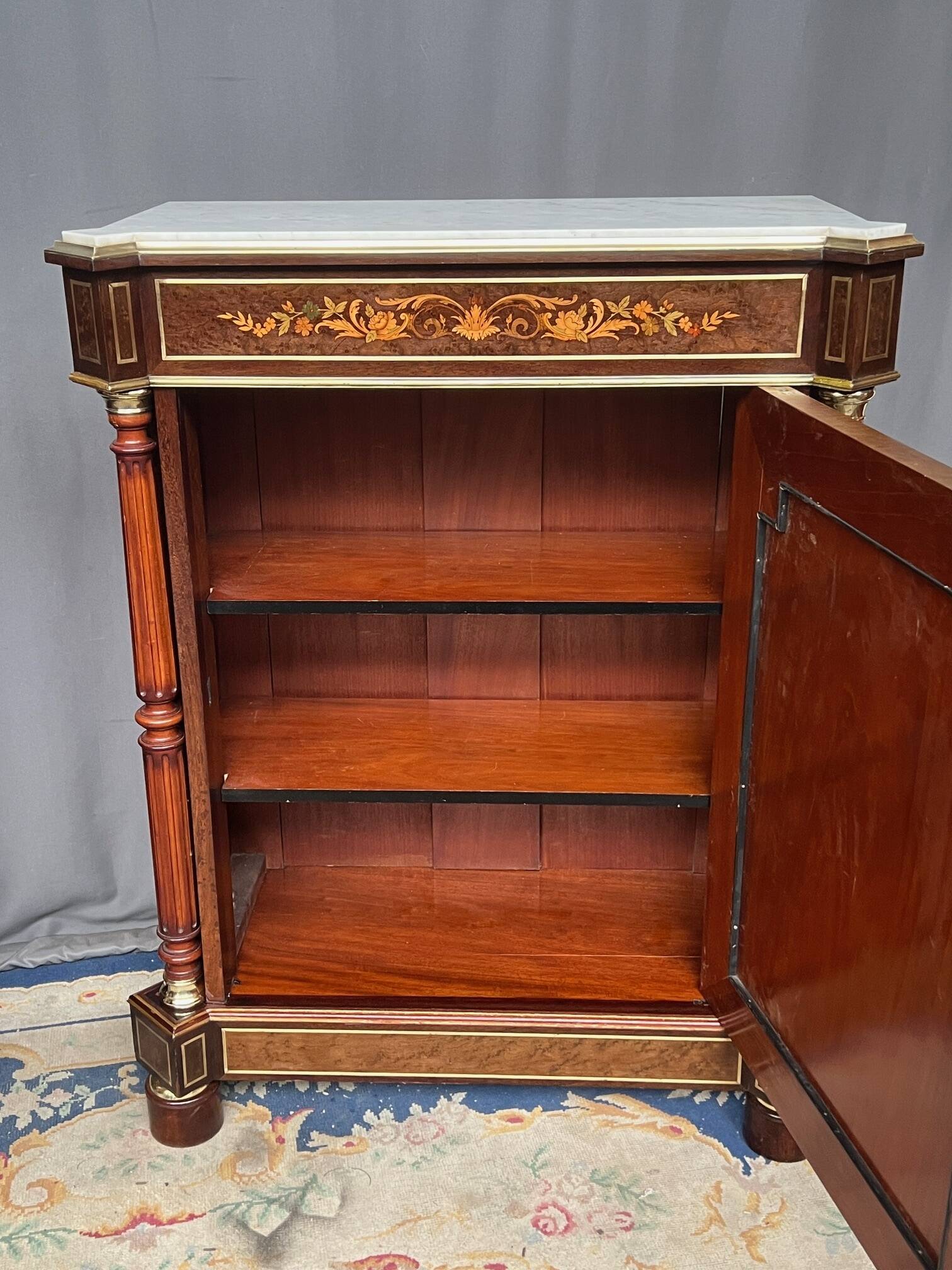 Elegant Napoleon III style commode. Marquetry in precious wood. Gilded bronze, marble top.