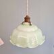 Trio of Art Deco pendant lights in scalloped opaline, 1920-30