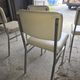 4 chrome metal chairs with faux leather from the 1970s.